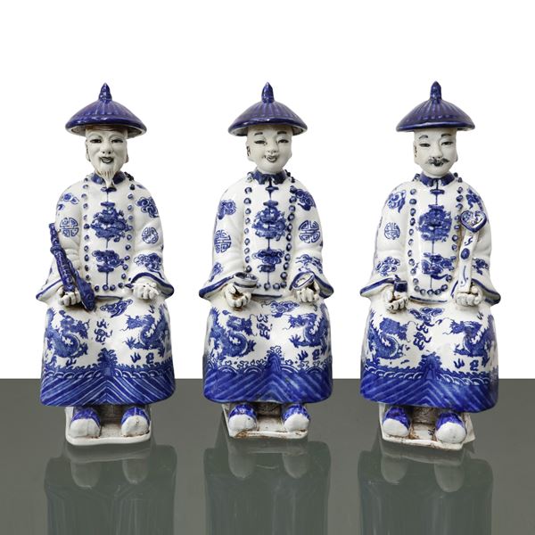 Triptych of statues depicting three generations of Chinese emperors, the three ages of man