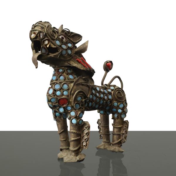 Brass Buddhist lion decorated with coral and turquoise