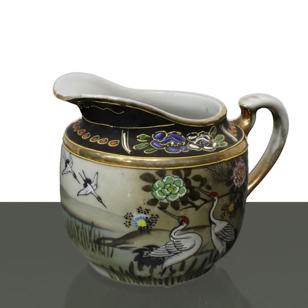 Lattiera giapponese in ceramica con decorazioni smaltate