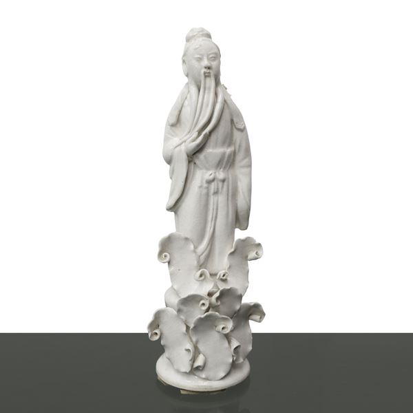 Statuina cinese di saggio in porcellana bianca