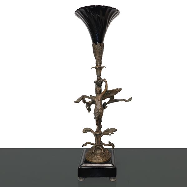 Metal sculpture with glass chalice