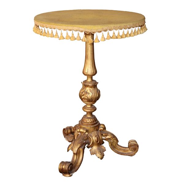 Tavolino con piano rotondo e base in legno dorato