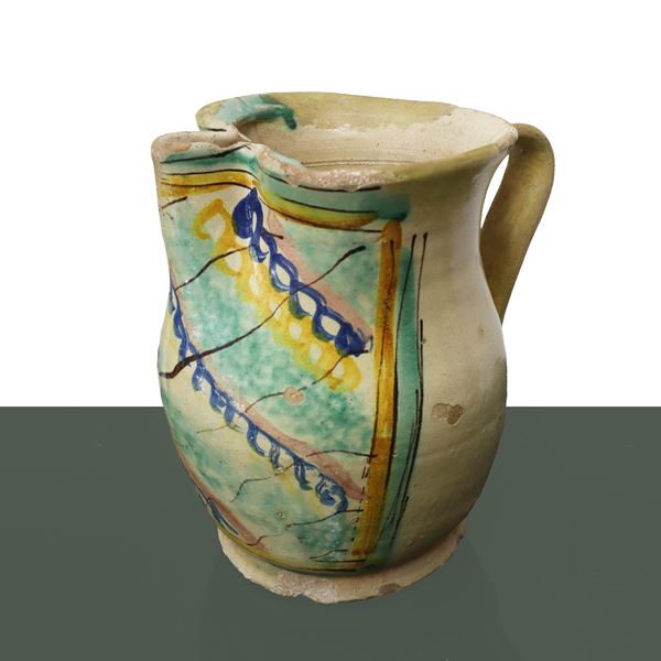 Polychrome spout barrel with oblique stripes