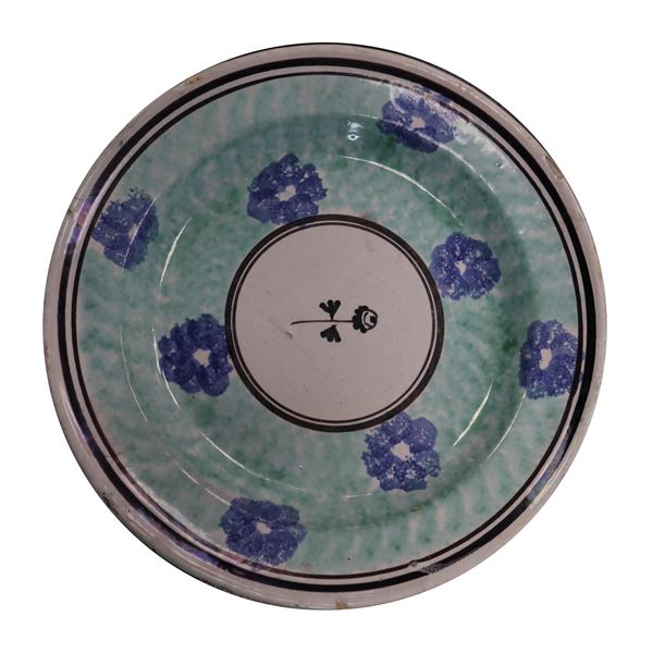Caltagirone majolica plate sponged with blue flowers