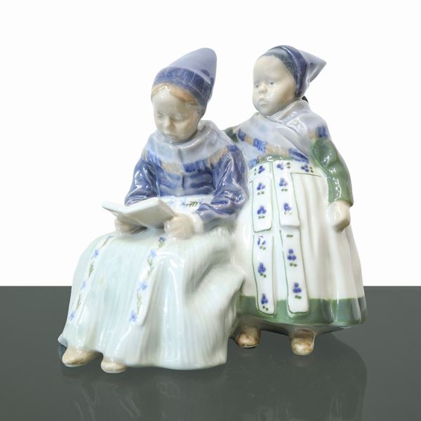 Pair of Amager girls with book