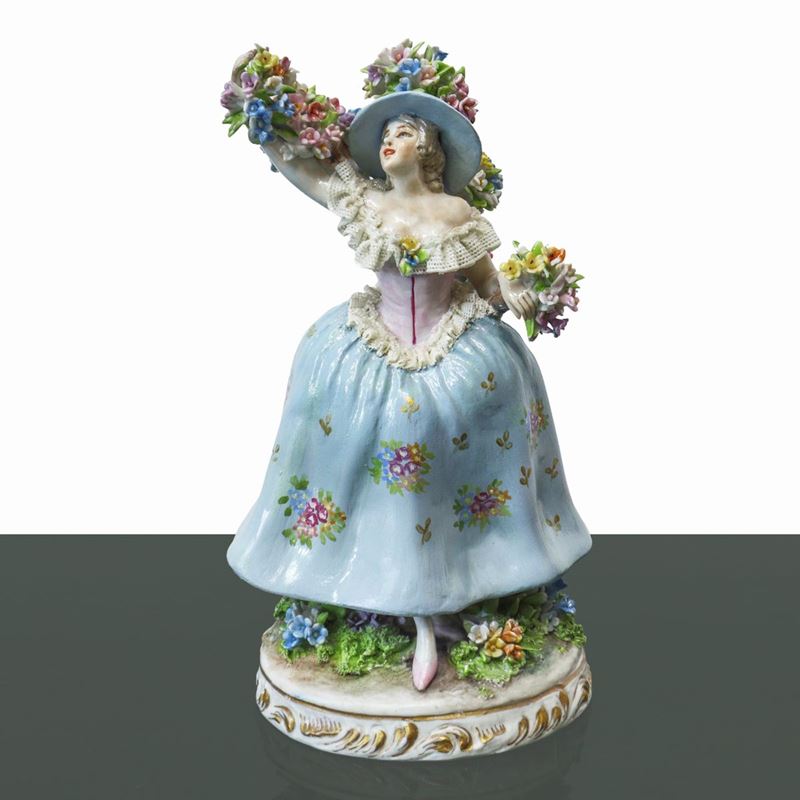 Donna davanti albero in fiore, porcellana di Capodimonte, collezione Fabris