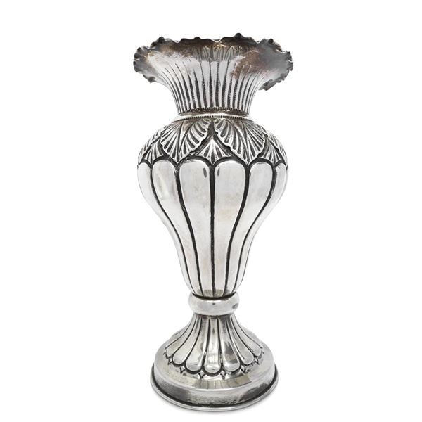Silver vase with leaf decorations