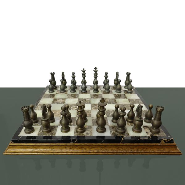 Alabaster chessboard with metal chessmen