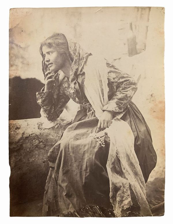Wilhelm von Gloeden (1856-1931), albumin photo depicting a young Sicilian girl. Numbered and hallmarked on the back 10. Cm 17x22

"Wilhelm Von Gloeden was a German-born photographer who spent most of his life in Sicily, specifically in Taormina, a city that he chose as a second home. It was the youth health issues to take in the peninsula. Specifically, the choice of Taormina is linked dreamy ideal of Sicily that the photographer releases in his pictures through the choice of models dressed as