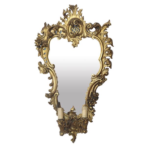 Gilded wooden mirror with candelabra