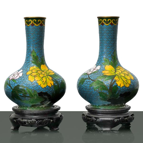Pair of cloisonne vases with light blue background with peach blossoms and little bird, gold decorations