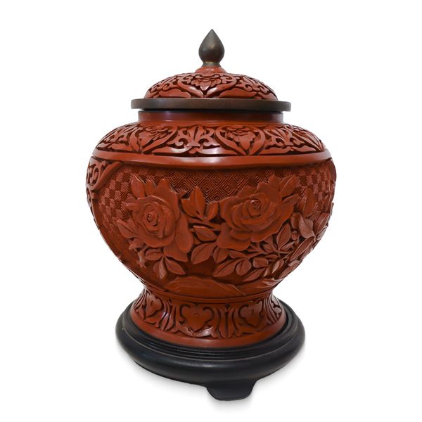 Chinese ginger jar carved in red lacquer with lid
