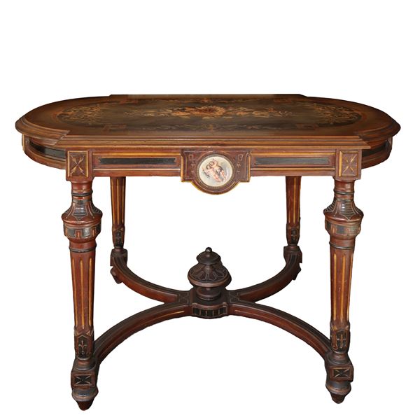 Coffee table with inlays on the top and round porcelains on the sides