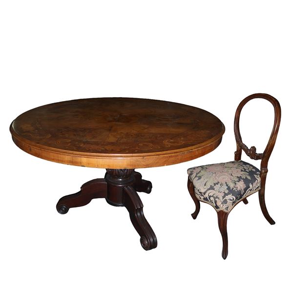 Round briar table with six chairs