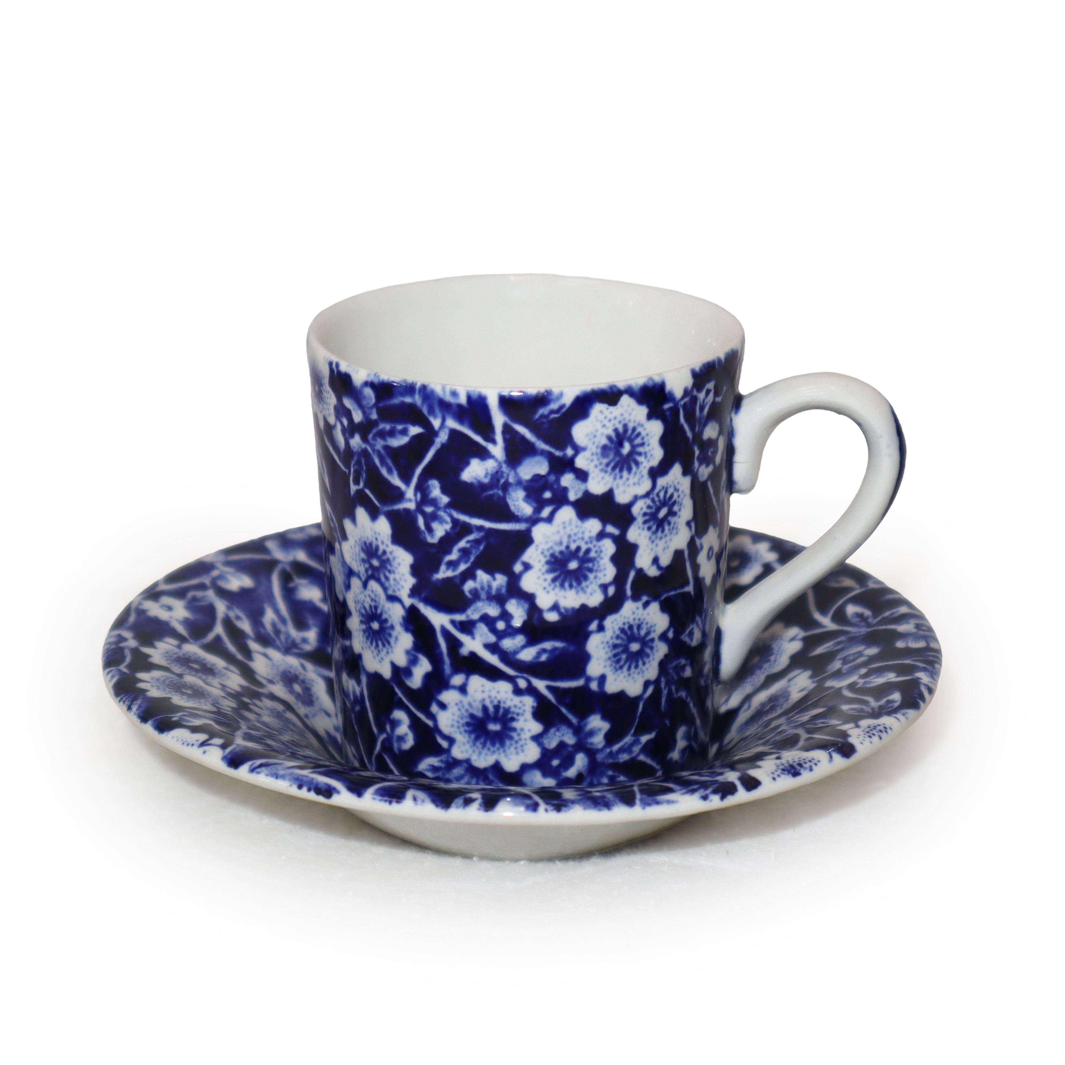 Servizio da caffe' in ceramica bianca con decori floreali blu
