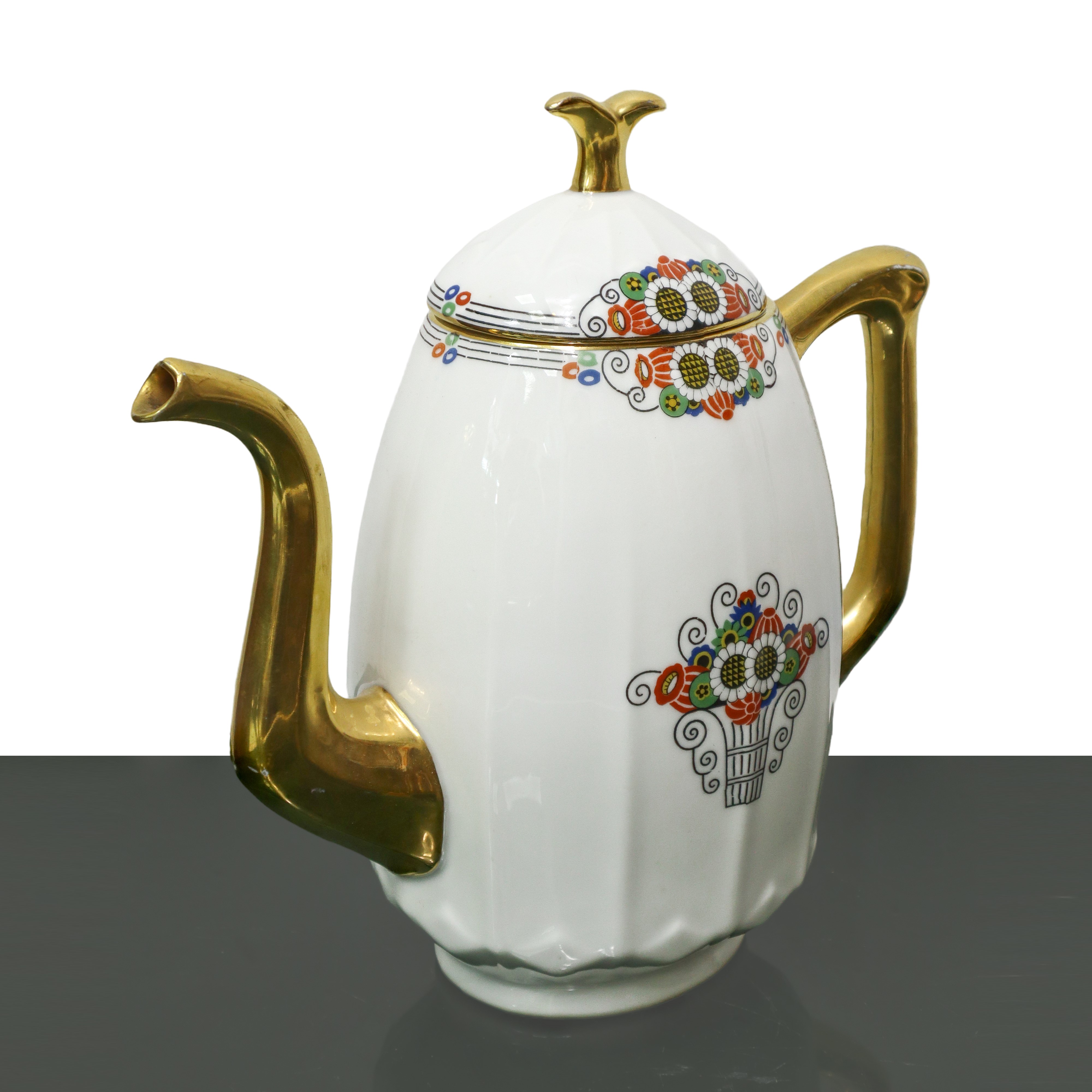 Teiera in porcellana con decorazioni di fiori e oro