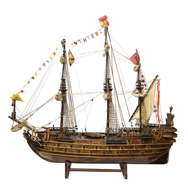 Large three-masted galleon titled Santissima Madre with closed sails