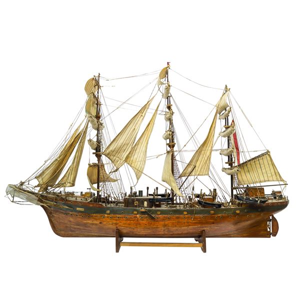 Large three-masted sailing ship with full sails