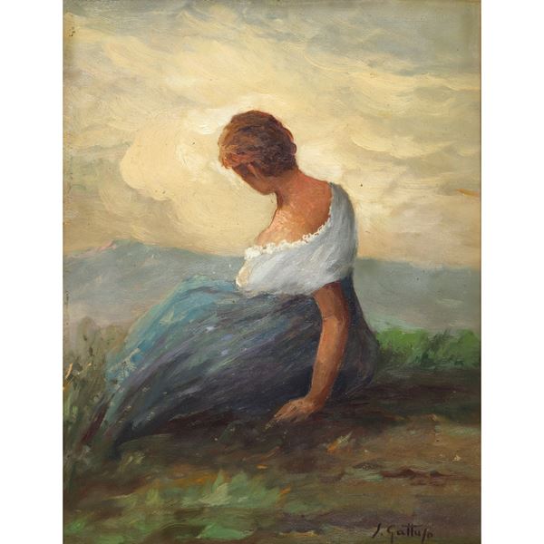 Woman sitting on meadow