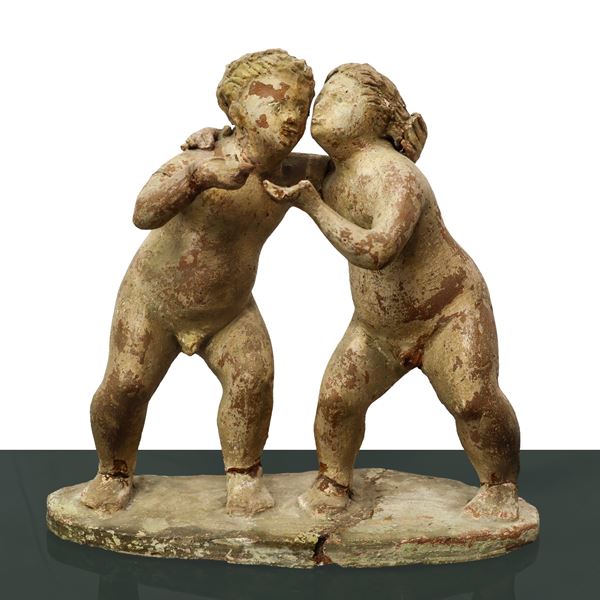 Giordano  Salvo - Due putti in terracotta