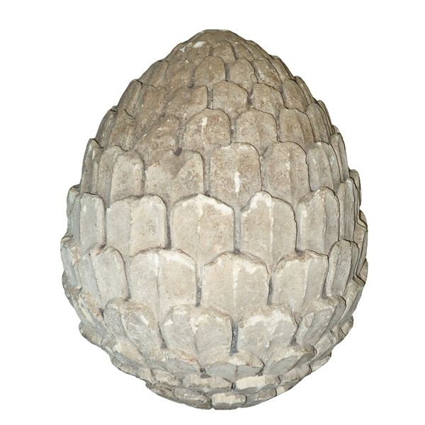 Large ornamental pine cone in white stone