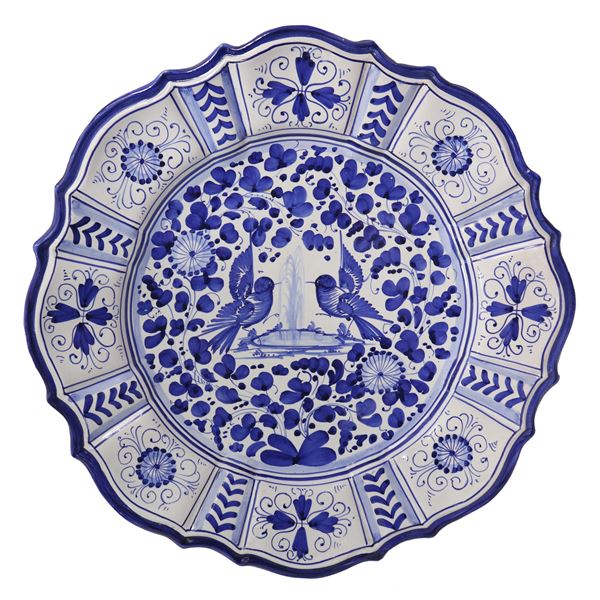 Scalloped wall plate, white base, floral and bird designs in shades of blue, Taormina