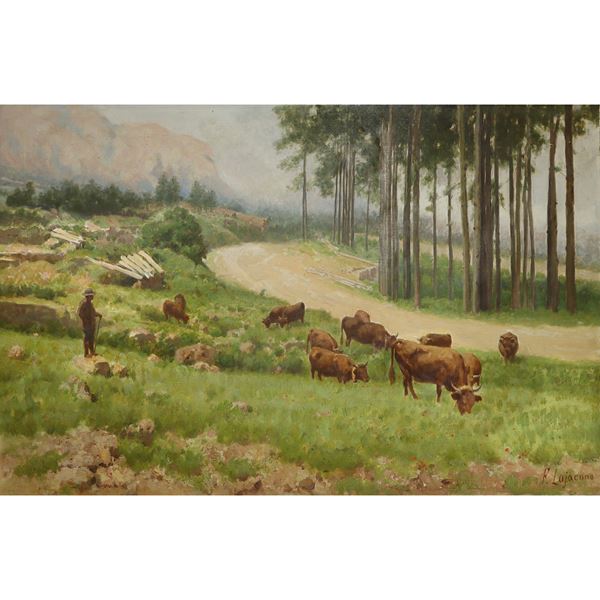 Paesaggio campestre con alberi e armenti lungo una strada delle Madonie