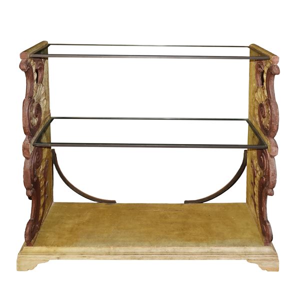 Console made with lacquered wooden fragments and two glass tops