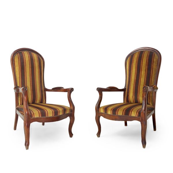 Pair of Voltaire armchairs in walnut wood and with golden velvet upholstery