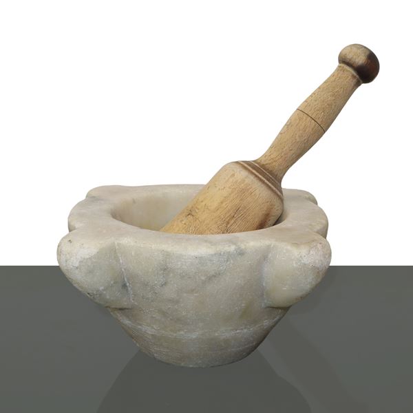 White marble mortar with wooden pestle