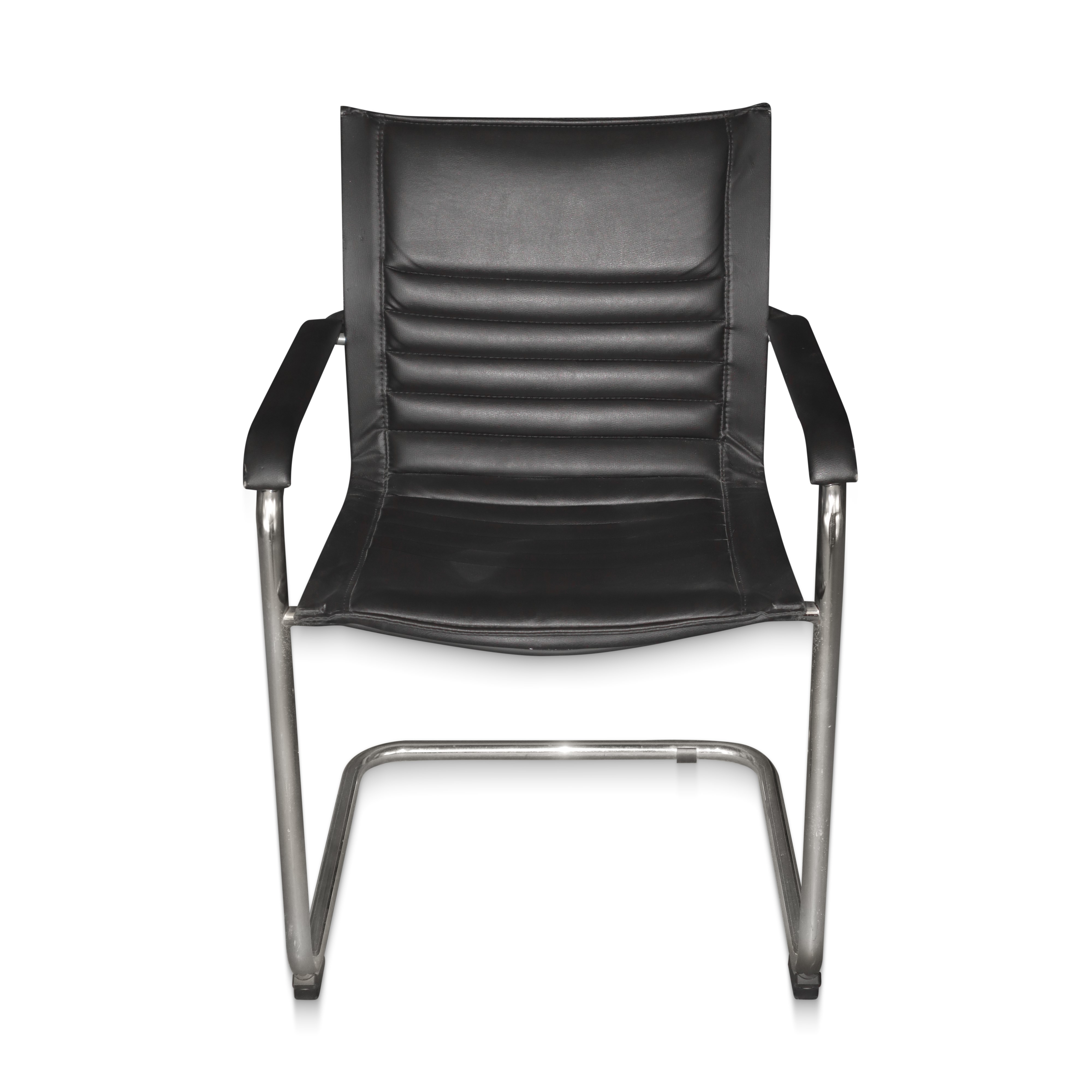 Quattro sedie vintage prod. Italia in pelle nera con base tubolare cromata