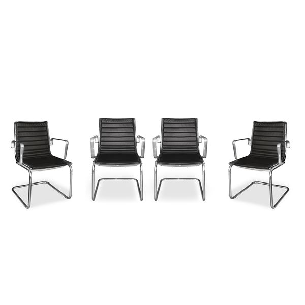 Four VINTAGE PROD. chairs. ITALY IN BLACK LEATHER WITH CHROME TUBULAR BASE and flat chrome armrests