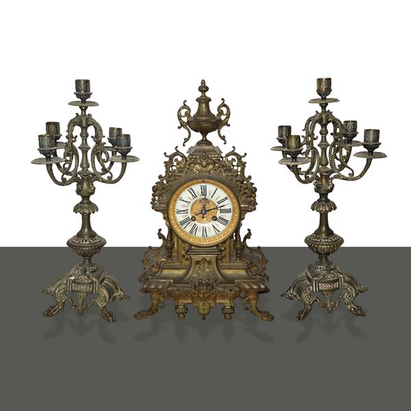 Triptych composed of a clock and two 5-light candlesticks