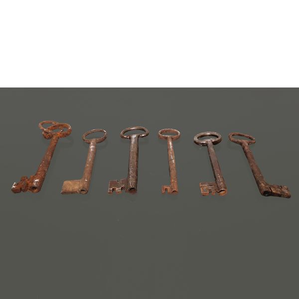 Six antique iron keys