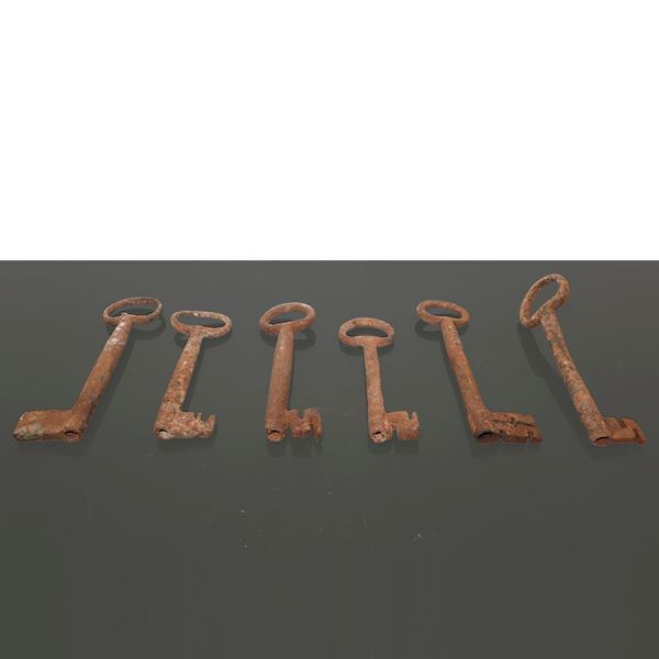 Six antique iron keys