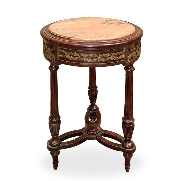 Round coffee table with marble top and Empire style applications