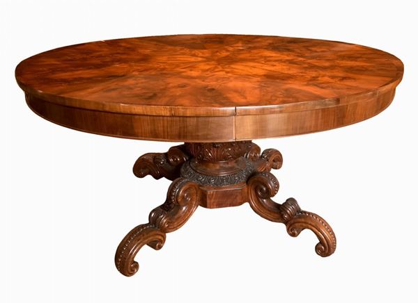 Extendable table central foot rosewood, four drawers at the base of the surface with five chairs. H 78 cm diameter 152 cm.