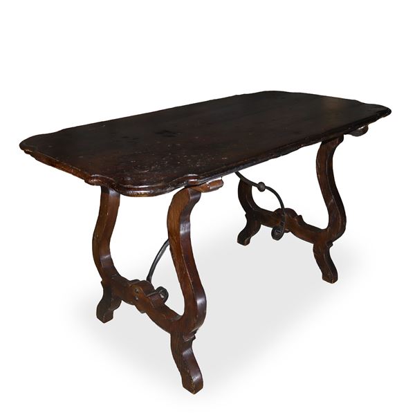 Walnut wood refectory table with owl's beak shaped top