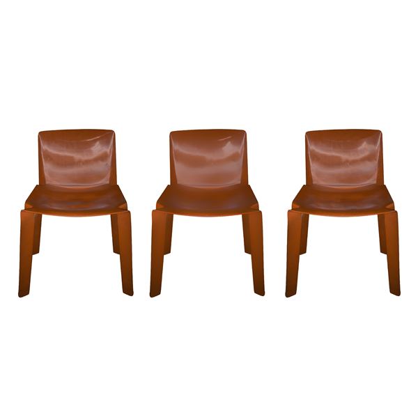 Three stackable chairs in stabilized polycarbonate, red, made in Italy