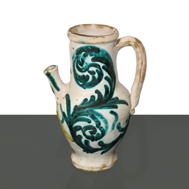 Versatoio con manico in maiolica di Caltagirone