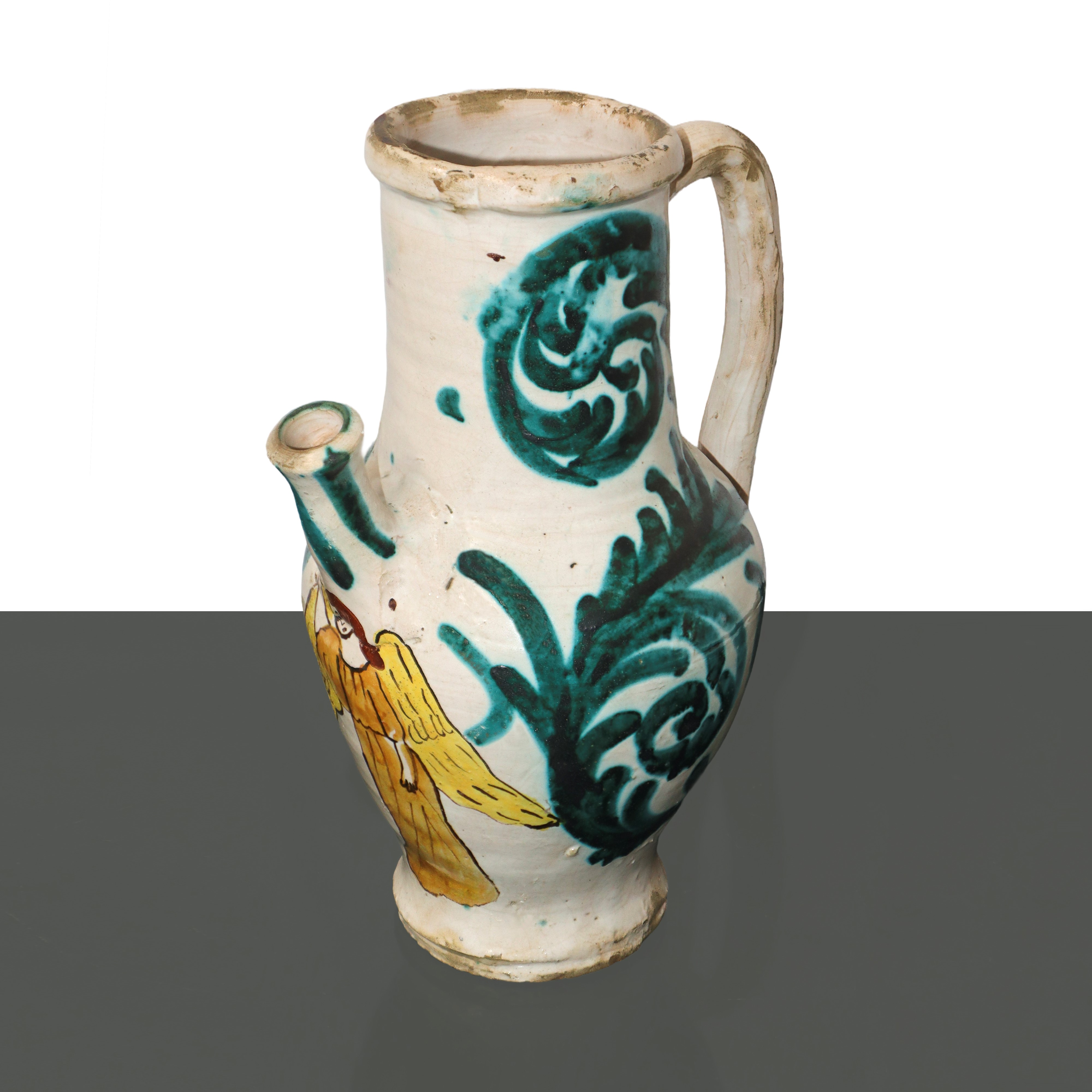 Versatoio con manico in maiolica di Caltagirone