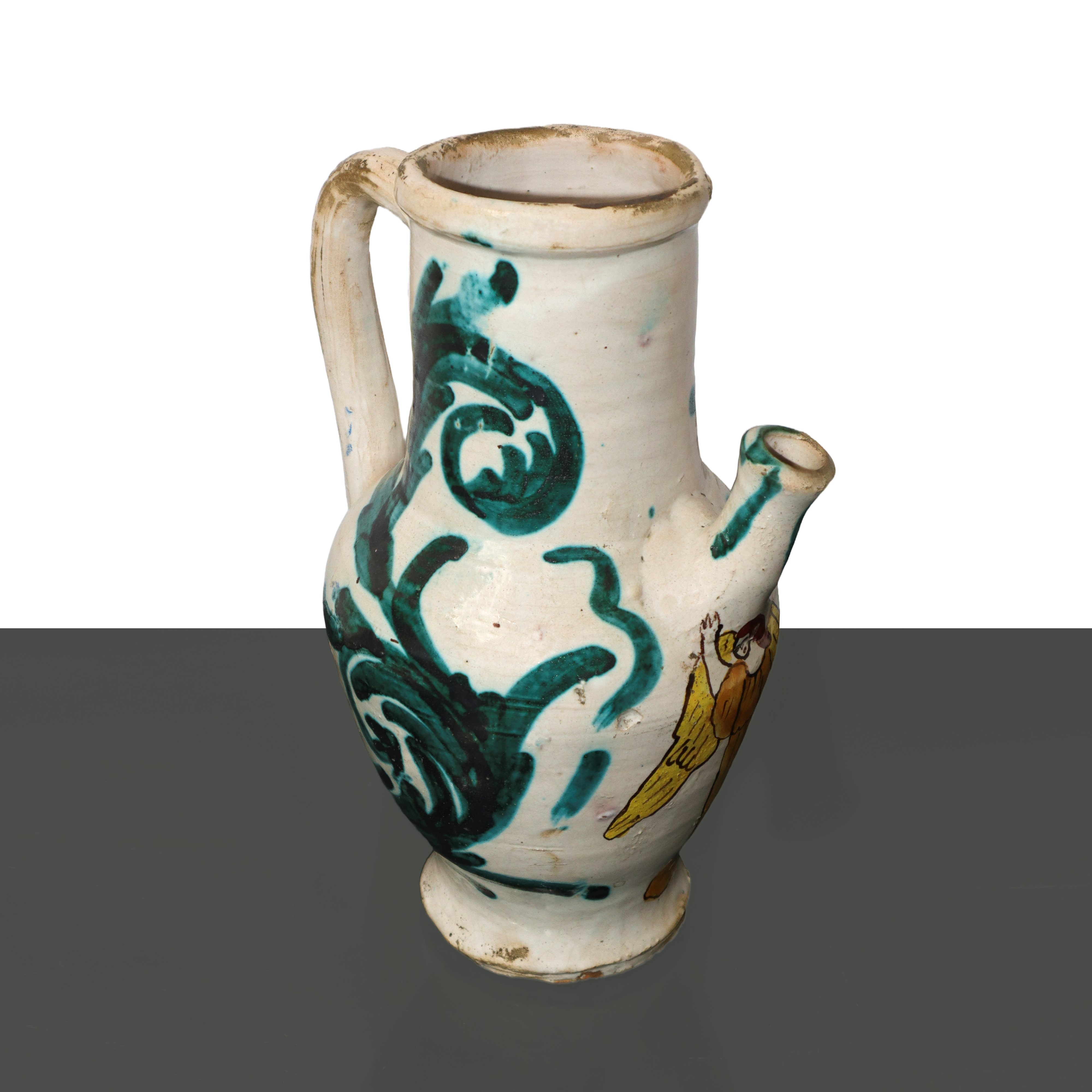 Versatoio con manico in maiolica di Caltagirone