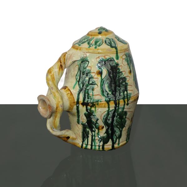 Barrel majolica flask, graffiti type decorated with verdigris foliage