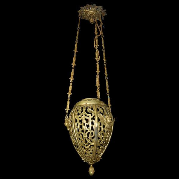 Lantern in perforated and golden metal