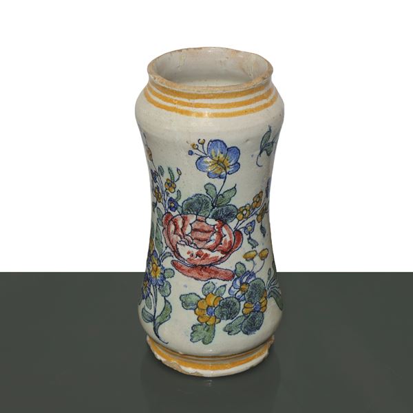 Neapolitan majolica albarello painted with flowers and butterflies