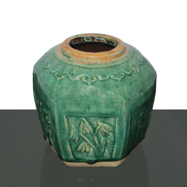 Hexagonal porcelain vase glazed in shades of green with floral motifs