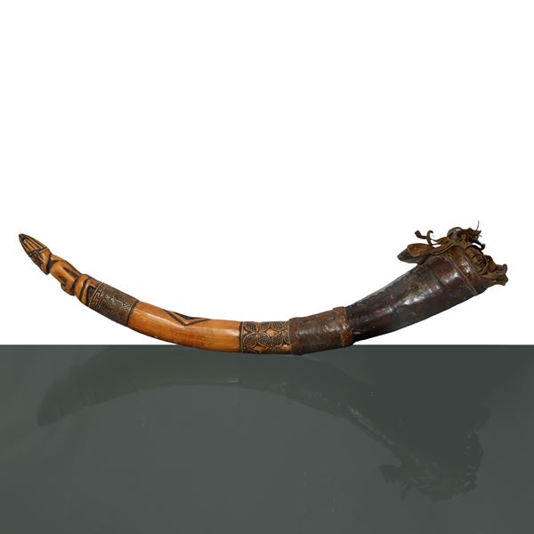 Tribal hunting horn, made of carved warthog tusk