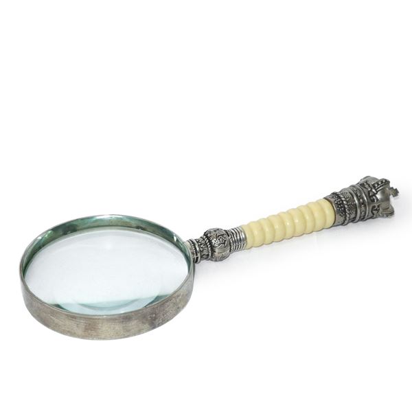 Magnifying glass with bone handle and silver crown-shaped end