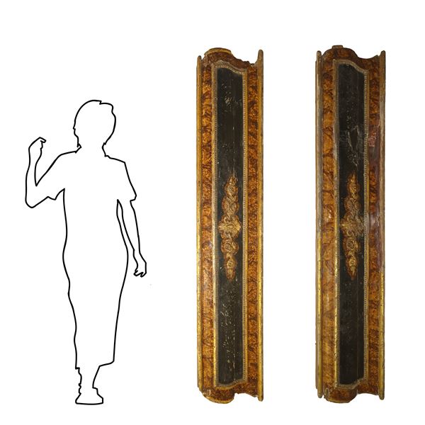 Pair of lacquered and gilded wooden fragments