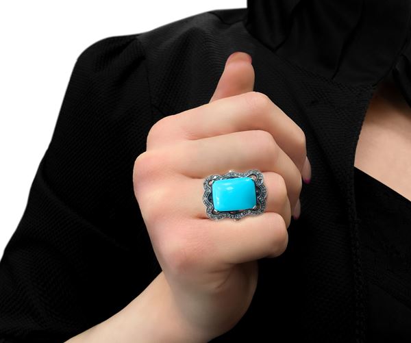 Gold ring and cupella with large rectangular turquoise surrounded by diamonds